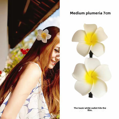 Dai people dress up seaside holiday egg flower hairpin travel photography headdress flower side clip small size fairy hairpin